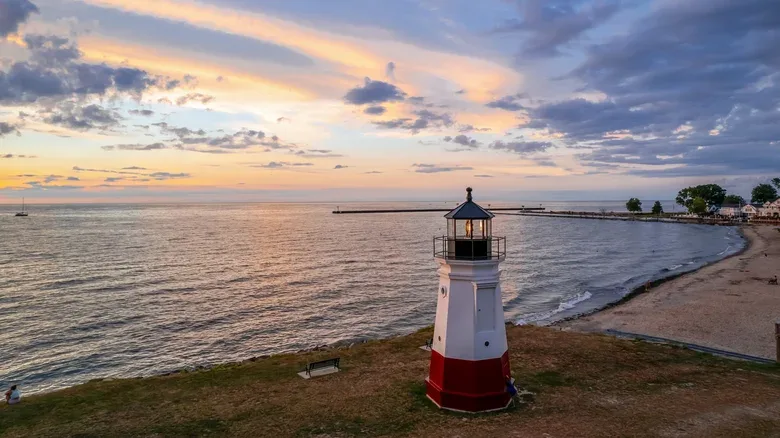 The Vermilion lighthouse on the Lake Erie shore at sunset