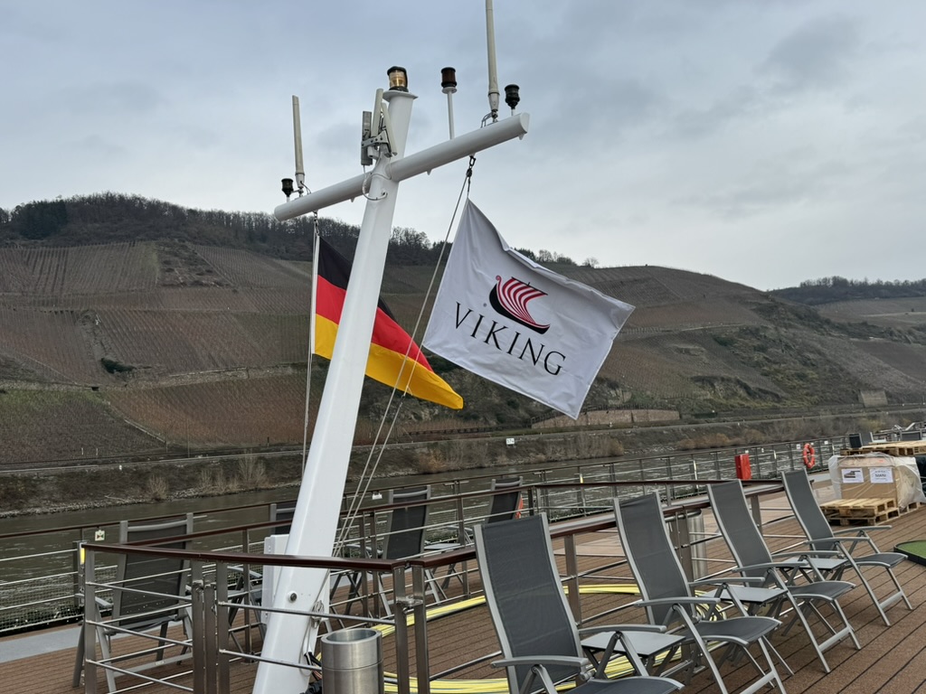 The Viking flag flying on the sun deck of a river cruise ship in Germany